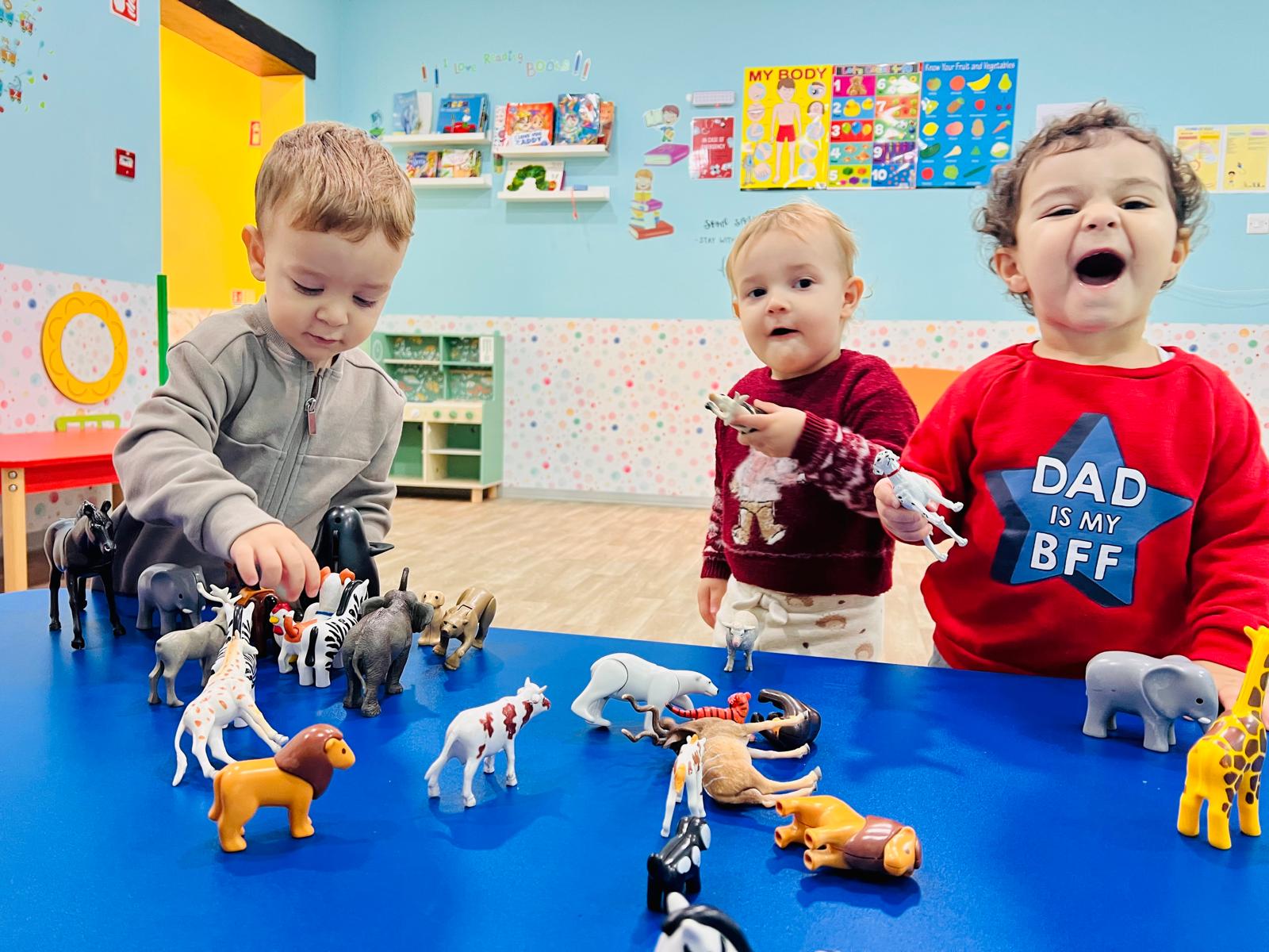 Small group exploring a playroom corner